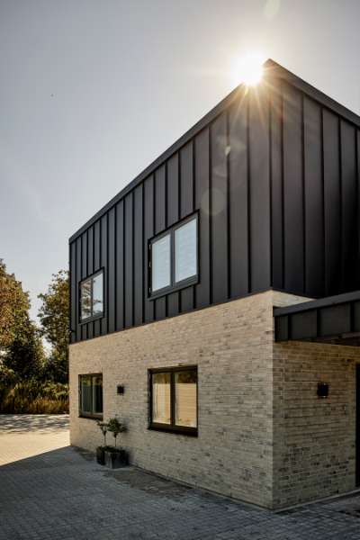 Stylish steel profiles on the façade of a newly built house with space for everything, Navervænget 9, 6710 Esbjerg, Denmark